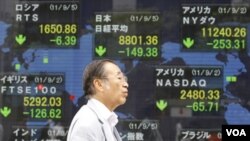 Suasana turunnya saham-saham Asia di lantai bursa saham Tokyo (5/9).