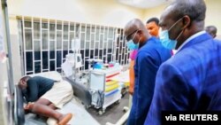 Lagos State Goveror Babajide Sanwo-Olu visits injured people at a hospital in Lagos, in this handout picture obtained by Reuters on Oct. 21, 2020, Nigeria. 