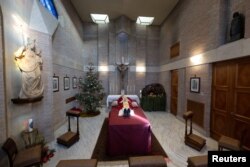 The body of former Pope Benedict is displayed at the Vatican