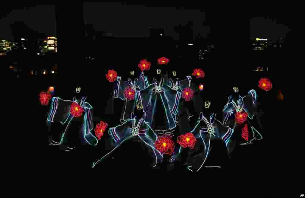 Dancers dressed in South Korean traditional &quot;Hanbok&quot; attire perform during a media preview of the Royal Culture Festival at the Gyeongbok Palace, the main royal palace during the Joseon Dynasty, in Seoul.