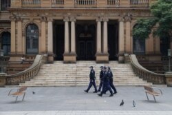 Police look to stop an anti-lockdown protest as a COVID-19 outbreak affects Sydney, July 31, 2021.