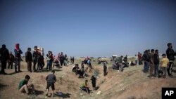 បាតុករ​ប៉ាឡេស្ទីន​ប៉ះ​ទង្គិច​ជាមួយ​អ៊ីស្រាអែល​នៅ​Gaza Strip កាលពី​ថ្ងៃសោរ៍ទី៣១ មីនា ២០១៨។