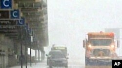 Ice. Snow. Flights canceled. Weather stalls travel in US and Europe