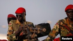 FILE - SPLA soldiers stand in a vehicle in Juba, December 20, 2013.