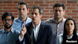 Venezuelan opposition leader Juan Guaido, who many nations have recognized as the country's rightful interim ruler, attends a news conference in Caracas, Venezuela March 21, 2019. 