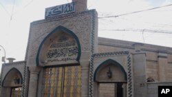 Masjid bersejarah al-Nuri yang terkenal di kota Mosul ketika masih berdiri megah (foto: Juli 2014). 