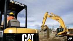FILE - Caterpillar machinery