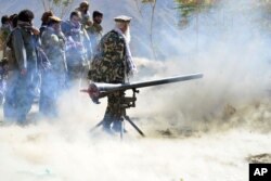 Militiamen loyal to Ahmad Massoud, son of the late Ahmad Shah Massoud, take part in a training exercise, in Panjshir province, northeastern Afghanistan, Monday, Aug. 30, 2021.