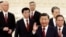 New Politburo Standing Committee members led by President Xi Jinping arrive to meet the media following the 20th National Congress of the Communist Party of China, at the Great Hall of the People in Beijing, Oct. 23, 2022. 