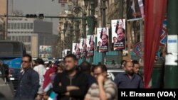 The campaign is driven largely by Egyptians' thirst for stability after years of turbulence following the popular uprising of 2011 that threw out longtime leader Hosni Mubarak. A campaign banner in downtown Cairo has the signatures of Sissi supporters. 