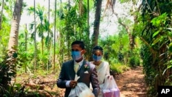 Family and friends urged them to postpone their April 27 wedding. Instead, the couple chose to celebrate their love by feeding the poor.