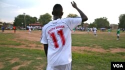 In this June 28, 2012 photo, a footballer for the new South Sudan national team wears a brand new shirt as the country prepares to play its first match around its first anniversary on July 9.