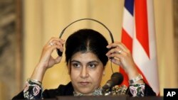 FILE - Former chair of Britain's Conservative party Sayeeda Warsi accuses EU opponents of 'hate and xenophobia'.