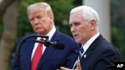 Predsednik Donald Tramp i potpredsednik Majk Pens na brifingu u Beloj kući 29. marta 2020. (Foto: AP Photo/Patrick Semansky)