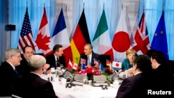 FILE - President Barack Obama (C) participates in a G7 leaders meeting during the Nuclear Security Summit in The Hague March 24, 2014.