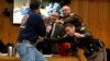Father of Sex Abuse Victims Tries to Attack Larry Nassar in Court