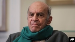 FILE - Greek painter Alekos Fassianos attends a ceremony recognizing his work as an artist, in Athens, Greece, Nov. 4, 2019. (Markos Chouzouris/Eurokinissi via AP)