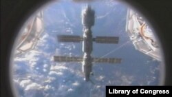 FILE - The International Space Station is pictured with the Earth in the background, Sept. 10, 2000.