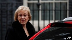FILE - Andrea Leadsom, leader of the House of Commons, leaves after attending a cabinet meeting at 10 Downing Street, in London, Dec. 18, 2018.