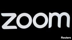FILE - The Zoom Video Communications logo is pictured at the NASDAQ MarketSite in New York, April 18, 2019. 