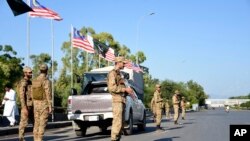 সমালোচকরা আশঙ্কা করছেন, আইনে সংশোধনীর ফলে সামরিক বাহিনীর জন্য ভিন্নমতাদর্শীদের দমন করা সহজ হবে। ফাইল ফটোঃ ৬ অক্টোবর, ২০২৪।