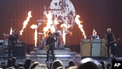 Green Day performs "Bang Bang" at the American Music Awards at the Microsoft Theater, Nov. 20, 2016.
