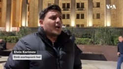 Tbilisi etirazlarında saxlanılan etnik azərbaycanlı zorakılığa məruz qaldığını deyir