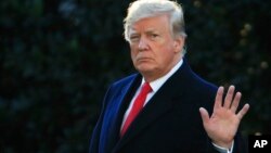 President Donald Trump waves as he leaves the White House in Washington, Oct. 24, 2018, to attend a campaign rally in Mosinee, Wisconsin. 