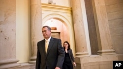 US House Speaker John Boehner walks to the House chamber on Capitol Hill, Oct. 3, 2013.