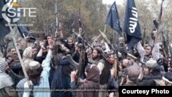 An Islamic State group vows allegiance to new Islamic State leader Abu Ibrahim al-Hashimi al-Qurashi, in this photo issued Nov. 5, 2019, by SITE Intelligence Group.