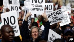 Demonstrators protest against South African President Jacob Zuma in Pretoria, South Africa, April 7, 2017. South Africans are gathering for nationwide demonstrations against Zuma, whose dismissal of the finance minister fueled concerns over government cor