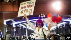 Demonstrators supporting a full ballot count gather outside the Philadelphia Convention Center three days after the presidential election polls closed as they await tabulation results, Friday, Nov. 6, 2020, in Philadelphia. (AP Photo/John Minchillo)