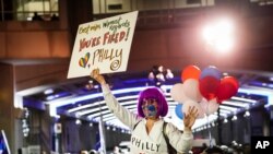 FILE - Demonstrators supporting a full ballot count gather outside the Philadelphia Convention Center three days after the presidential election polls closed as they await tabulation results, Nov. 6, 2020, in Philadelphia. 