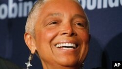 FILE - Dr. Camille Cosby, wife of comedian Bill Cosby, attends the Jackie Robinson Foundation annual awards dinner, March 3, 2008, in New York.