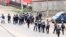 FILE - A still image taken from a video shows riot police walkin along a street in the English-speaking city of Buea, Cameroon, Oct. 1, 2017. 