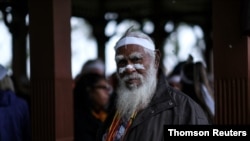 FILE - Aboriginal groups march against planned changes in heritage protection laws, in Perth