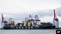 The CMA CGM Symi is seen at port in Valencia, Spain, on Oct. 22, 2023. The container ship, owned by an Israeli billionaire, came under attack by a suspected Iranian drone in the Indian Ocean, a U.S. defense official said on Nov. 25. (Manuel Hernandez Lafuente via AP)