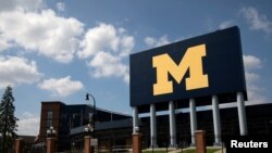 FILE - An empty Michigan Stadium is seen on the University of Michigan campus amid reports of college football cancellation, during the outbreak of the coronavirus disease (COVID-19), in Ann Arbor, Michigan, August 10, 2020.