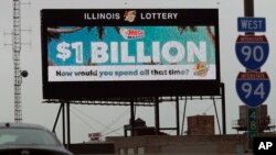 A digital billboard along I-90/94 highway in Chicago, displays the estimated Mega Millions jackpot, Oct. 19, 2018. 