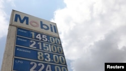 The prices of petrol, diesel, kerosene and LPG are displayed in Naira outside a gas station in Lagos, Nigeria, Sept. 9, 2019.