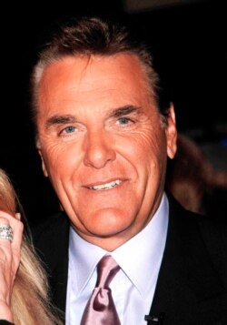 FILE - Chuck Woolery in Los Angeles, December 11, 2002.