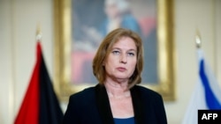 Ketua juru runding dan Menteri Kehakiman Israel Tzipi Livni dalam jumpa pers di Kementerian Luar Negeri AS di Washington, D.C., Juli 2013. 