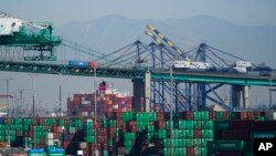 Containers are stacked at the Port of Los Angeles in Los Angeles, Oct. 1, 2021.