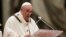 Pope Francis celebrates Christmas Eve Mass, at St. Peter's Basilica, at the Vatican, Dec. 24, 2021.