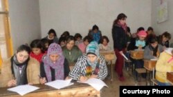 Students learn the Kurdish language at a local school in Amude, Syria, in August 2015. (Photo courtesy of Bedirxan Committee for Teaching Kurdish)