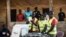 FILE - Election officials start counting votes at a polling station in the Bairro Militar area of the capital Bissau, in Guinea-Bissau, Nov. 24, 2019.