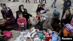 En Grèce, les migrants sont arrivés dans un camp de réfugiés, le 21 octobre 2015.