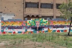 A mural said to be representing diversity and tolerance is seen on wall at a park in Raqqa, Syria, June 25, 2019. (Courtesy photo)