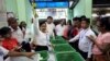 An Union Election Commission staff counts votes at a polling station during for the by-election in Yangon, Myanmar, November 3, 2018. REUTERS/Ann Wang - RC1FC5EF45A0