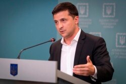 Ukrainian President Volodymyr Zelenskiy speaks to media during his press conference in Kyiv, Ukraine, Oct. 1, 2019.